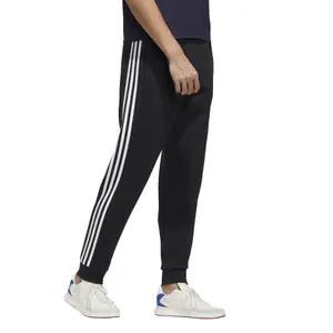 Joggingbyxa adidas Essentials Colorblock image-4