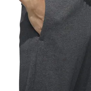 Pantalón de chándal adidas Essentials Fleece image-6