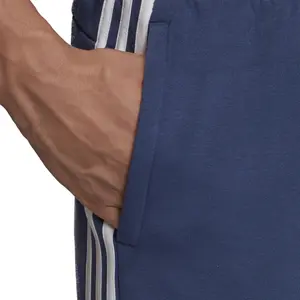 Pantalón de chándal adidas Essentials 3-Stripes Tapered image-6