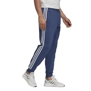 Pantalón de chándal adidas Essentials 3-Stripes Tapered image-2