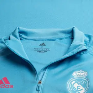 Top da allenamento con 1/4 di zip Real Madrid 2020/21 image-1