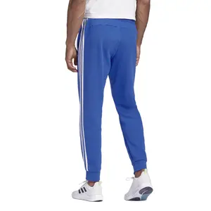 Pantalón de chándal adidas Essentials 3-Stripes Tapered Cuffed image-5