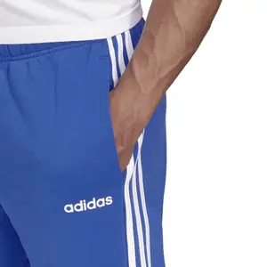 Pantalón de chándal adidas Essentials 3-Stripes Tapered Cuffed image-6