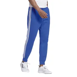 Pantalón de chándal adidas Essentials 3-Stripes Tapered Cuffed image-2