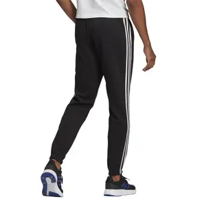 Pantalón adidas Essentials Fleece Tapered Elastic image-4