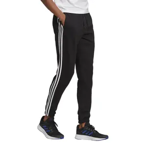 Pantalón adidas Essentials Fleece Tapered Elastic image-5