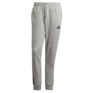 Spodnie do biegania adidas Essentials French Terry Tapered Cuff 3-Bandes image-0