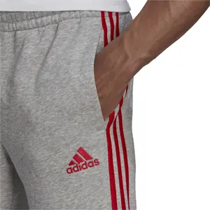 Pantalones adidas Essentials Fleece Tapered Elastic Cuff 3-Stripes image-3
