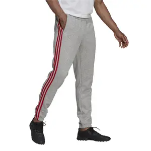 Pantalones adidas Essentials Fleece Tapered Elastic Cuff 3-Stripes image-6