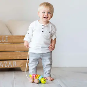 Pull and push toy Goula image-3