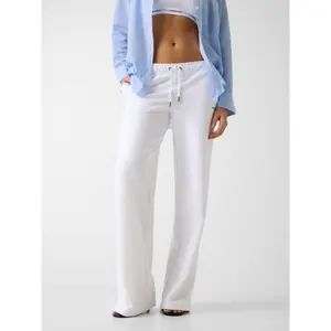 Women's joggers Guess Iconic Embro image-2