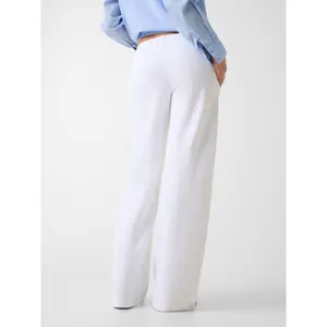 Women's joggers Guess Iconic Embro image-3