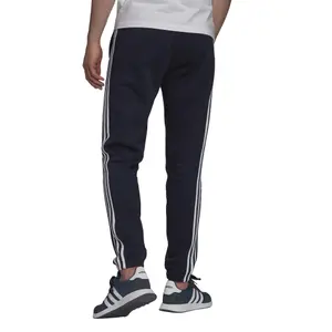 Pants adidas Essentials Fleece Tapered Elastic image-1