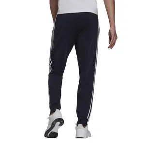 Pantalón adidas Primegreen Essentials Warm Up Tapered 3 Stripes image-1