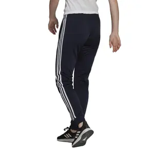 Pantalón adidas Primegreen Essentials Warm Up Slim Tapered 3 Stripes image-1