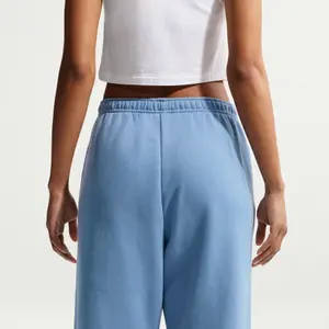 Damskie spodnie dresowe Nike Studio image-3