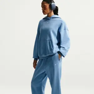 Damskie spodnie dresowe Nike Studio image-4