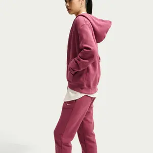 Damskie spodnie dresowe Nike Studio image-3