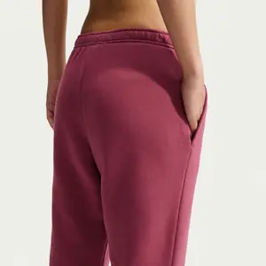 Damskie spodnie dresowe Nike Studio image-4