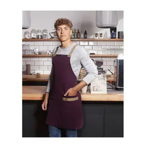 Bib apron with crossed straps and pocket Karlowsky image-1