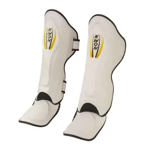 406650-protege-tibias-boxe-thai-kwon-blanc