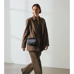 Women's clutch bag Le Tanneur Amenagee