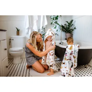 Cotton muslin-lined bath cape and baby washcloth Little Unicorn Woof image-5