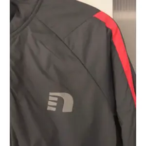 Chaqueta impermeable Newline Cross image-2