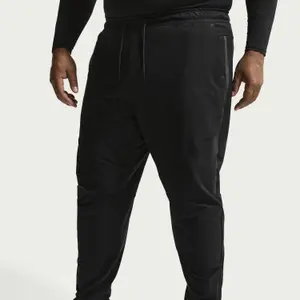 Tepláky z úpletu Nike Shori image-5