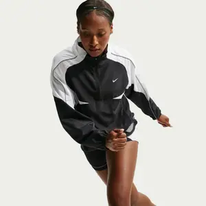 Women's waterproof jacket Nike Tempo Swoosh image-4