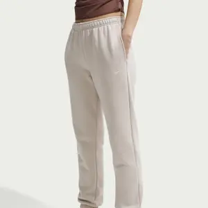 Damskie spodnie dresowe Nike Studio Medium image-2