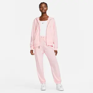 Damskie spodnie dresowe Nike Vintage image-1