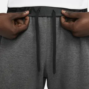 Zúžené běžecké kalhoty Nike TF image-4