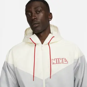 Waterproof jacket with woven lining Nike Windrunner GX image-3