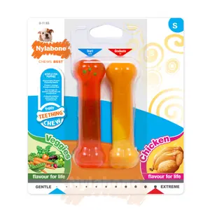 983328eu-uppsattning-med-2-hundleksaker-nylabone-puppy-extreme-chew-chicken-and-moderate-chew-veggies-flavour-s-rod-gul-s