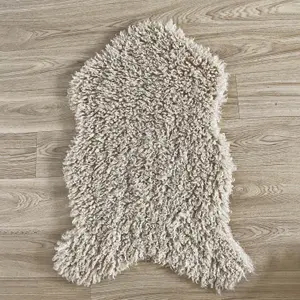 Faux fur curly animal skin rug Opjet Octave image-1