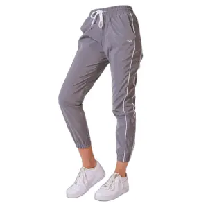 Pantalón de chándal elástico reflectante con piping para mujer Project X Paris image-1