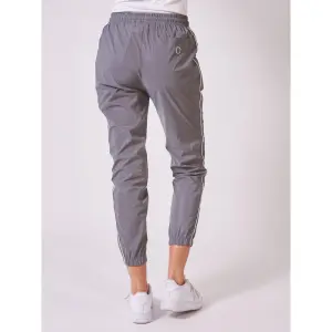 Pantalón de chándal elástico reflectante con piping para mujer Project X Paris image-2