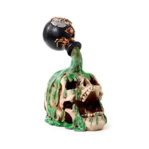 Decorative Skull Figurine with Green Potion Puckator image-0