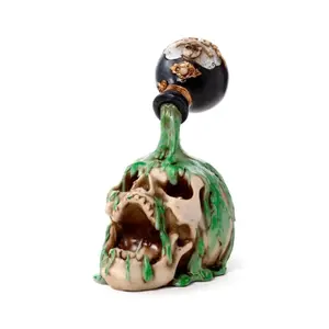 Decorative Skull Figurine with Green Potion Puckator image-2