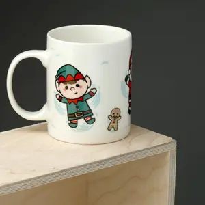 Festliche Porzellantasse mit weihnachtlichen Figuren Puckator image-1