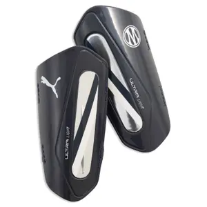 Protector de canelas OM Ultra Light 2026/27