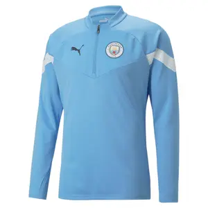 Top per la formazione Manchester City 2022/23 image-0