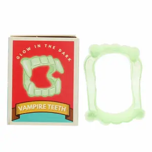 Vampyrtänder som lyser i mörkret Rex London image-0