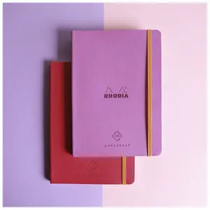 Cuaderno de papel marfil con esquinas microperforadas y goma elástica Rhodia Perpetual image-2
