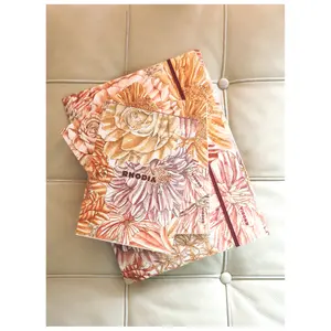 A5 lined notebook, 70 ivory paper sheets Rhodia orange Botanique image-1