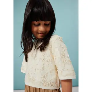 Pull de punto con lentejuelas y estampado floral niña s.Oliver image-5