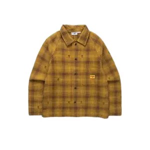 sw172-ochre-jacke-service-works-thistle-plaid-front-of-house-ockerfarben