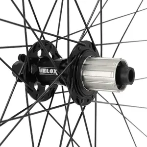 Roue de vélo VTT arrière moyeu roulement disc 6 trous (compatible tubeless et tubetype) pour axe traversant 12-142 pour pneu 29 x 2.00-2.50 - jante intérieure 30 mm Velox Trucky 30 Disc 11-10V. image-2