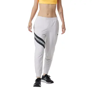Damskie spodnie dresowe New Balance Relentless Terry image-0